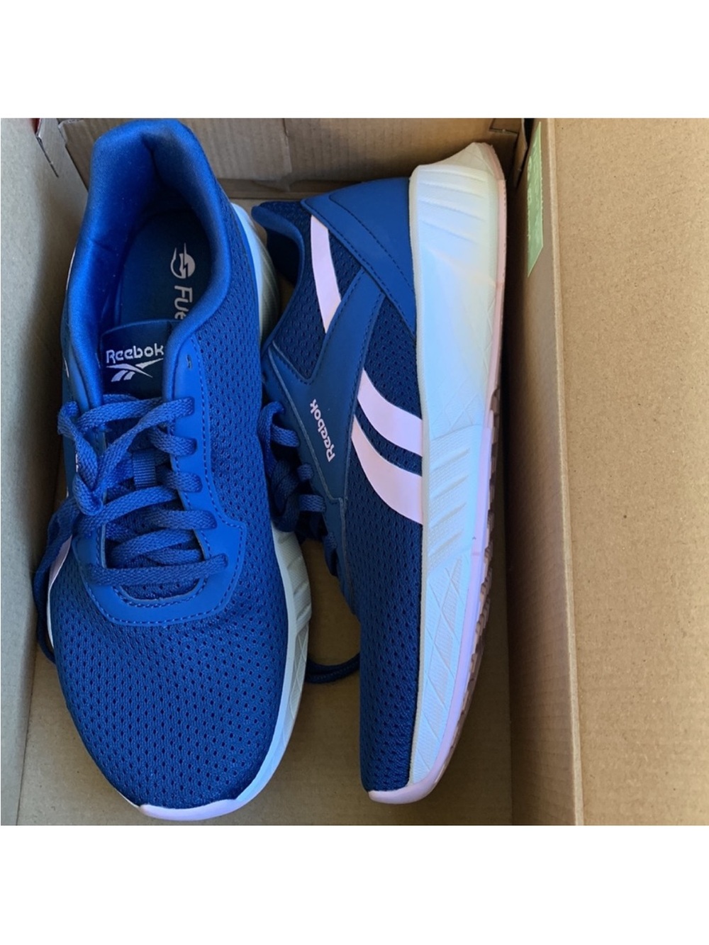 Reebok Women’s Blue Athletic Sneakers with Pink Accents